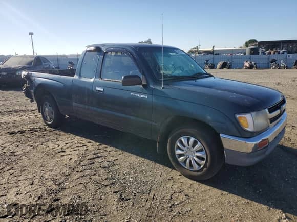 1997 Toyota Tacoma with VIN 4TAVL52N7VZ330736, listed as a Copart auction lot 82432415 with 376,229 mi miles and Salvage title. Bid and sale history available at DreamBid. Image 4.