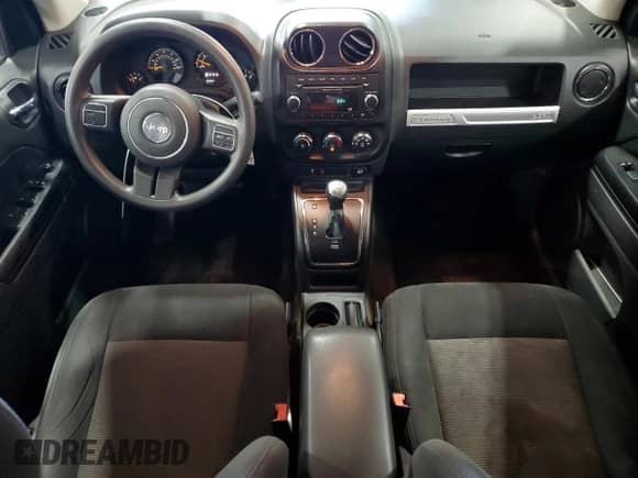 2014 Jeep Compass Sport with VIN 1C4NJDBB9ED842554, listed as a Copart auction lot 69468485 with 124,308 mi miles and Salvage title. Bid and sale history available at DreamBid. Image 8.