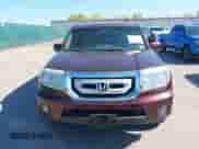 2010 Honda Pilot Touring with VIN 5FNYF4H99AB040690, listed as a IAAI auction lot 43338979 with 228,177 mi miles and . Bid and sale history available at DreamBid. Image 12.