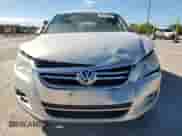 2011 Volkswagen Tiguan S с VIN WVGBV7AX9BW524239, выставлен на аукционе Copart как лот 70093625 с пробегом 174 582 миль миль и Списание • Salvage title. История ставок и продаж доступна на DreamBid. Изображение 5.