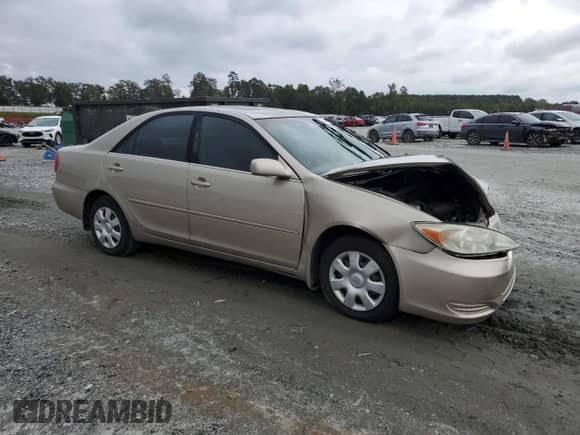 2003 Toyota Camry LE с VIN 4T1BE32K53U715889, выставлен на аукционе Copart как лот 84467025 с пробегом 200 315 миль миль и Списание • Salvage title. История ставок и продаж доступна на DreamBid. Изображение 4.