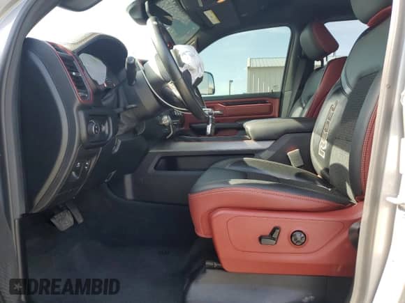 2020 Ram 1500 Rebel z VIN 1C6SRFLT7LN199084, wystawiony jako Copart lot #64990655 z przebiegiem 143 021 mil mil oraz Nie do naprawy • Non repairable. Historia ofert i sprzedaży dostępna na DreamBid. Obrazek 7.