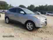 2013 Hyundai Tucson GLS z VIN KM8JUCAC9DU695785, wystawiony jako Copart lot #65765125 z przebiegiem 129 941 mil mil oraz Szkoda całkowita • Salvage title. Historia ofert i sprzedaży dostępna na DreamBid. Obrazek 4.
