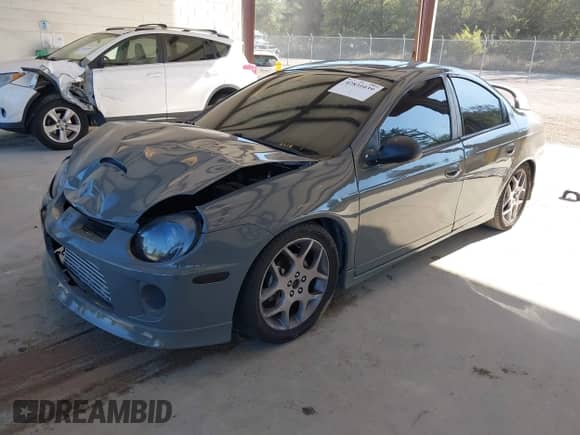 2004 Dodge Neon SRT-4 z VIN 1B3AS66SX4D553216, wystawiony jako IAAI lot #42831039 z przebiegiem 195 508 mil mil oraz . Historia ofert i sprzedaży dostępna na DreamBid. Obrazek 2.