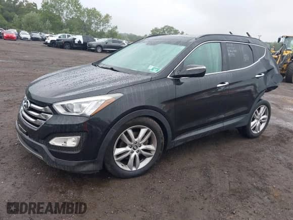 2014 Hyundai Santa Fe z VIN 5XYZWDLA0EG222573, wystawiony jako IAAI lot #43023853 z przebiegiem 108 503 mil mil oraz . Historia ofert i sprzedaży dostępna na DreamBid. Obrazek 2.