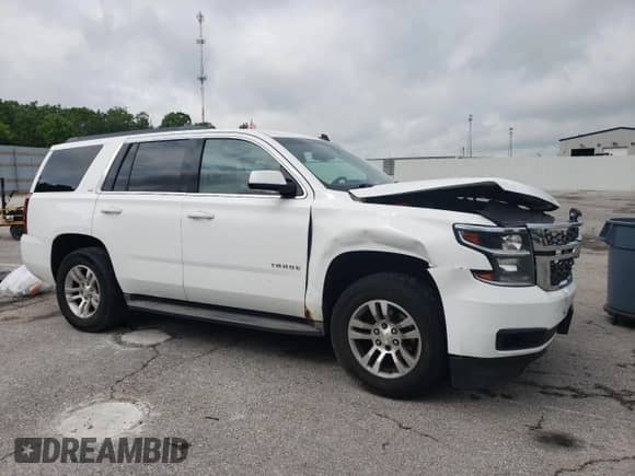 2015 Chevrolet Tahoe LS with VIN 1GNSKAKC6FR284469, listed as a Copart auction lot 57643795 with 213,899 mi miles and Salvage title. Bid and sale history available at DreamBid. Image 4.