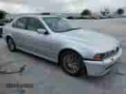 2002 BMW 5 Series 530i with VIN WBADT53482CE93352, listed as a Copart auction lot 51579024 with 149,521 mi miles and Salvage title. Bid and sale history available at DreamBid. Image 4.