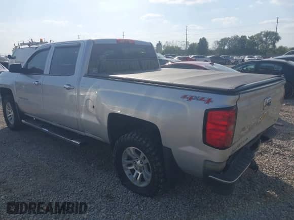 2014 Chevrolet Silverado 1500 LT with VIN 3GCUKREC0EG343333, listed as a IAAI auction lot 43328983 with 143,254 mi miles and . Bid and sale history available at DreamBid. Image 3.