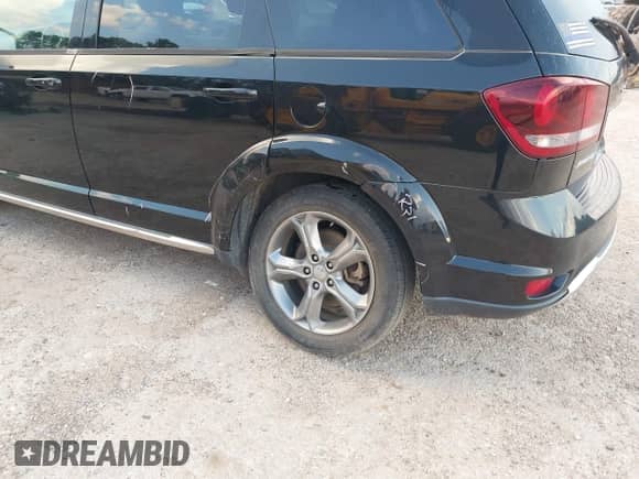 2017 Dodge Journey Crossroad with VIN 3C4PDCGB9HT677638, listed as a IAAI auction lot 42902275 with 93,682 mi miles and . Bid and sale history available at DreamBid. Image 6.