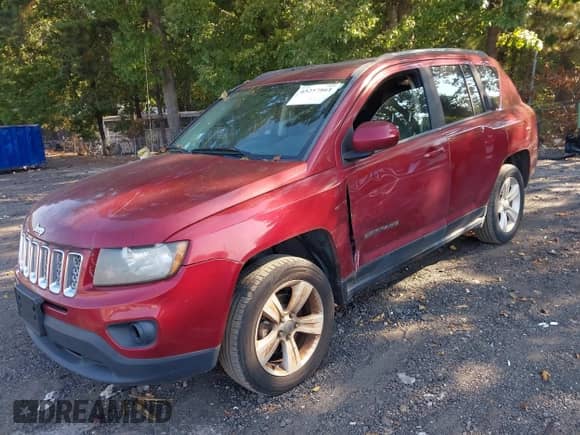 2014 Jeep Compass Latitude with VIN 1C4NJCEB9ED503072, listed as a IAAI auction lot 43257861 with 186,684 mi miles and . Bid and sale history available at DreamBid. Image 2.