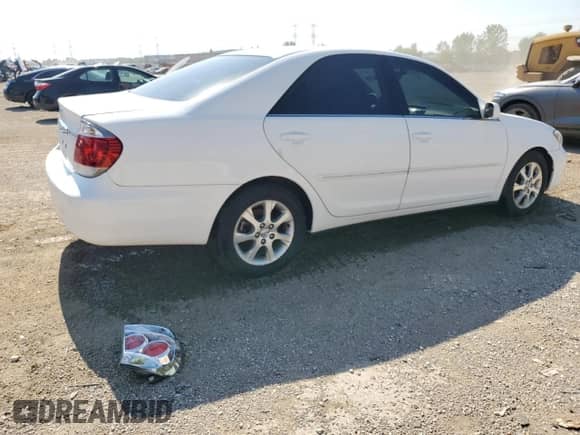 2005 Toyota Camry LE с VIN 4T1BE30K95U613999, выставлен на аукционе Copart как лот 80613715 с пробегом 168 072 миль миль и Списание • Salvage title. История ставок и продаж доступна на DreamBid. Изображение 3.