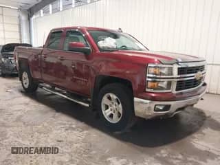 2015 Chevrolet Silverado 1500 LT with VIN 1GCVKREC3FZ222351, listed as a IAAI auction lot 42243810 with 82,792 mi miles and . Bid and sale history available at DreamBid. Image 1.