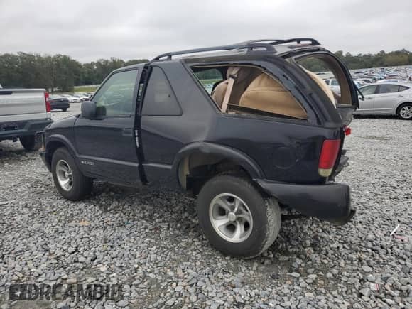 2002 Chevrolet Blazer LS с VIN 1GNCS18W32K232872, выставлен на аукционе Copart как лот 79888924 с пробегом 110 591 миль миль и Списание • Salvage title. История ставок и продаж доступна на DreamBid. Изображение 2.