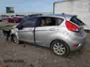 2011 Ford Fiesta SE with VIN 3FADP4EJ8BM111987, listed as a Copart auction lot 65947805 with 115,682 mi miles and Salvage title. Bid and sale history available at DreamBid. Image 2.