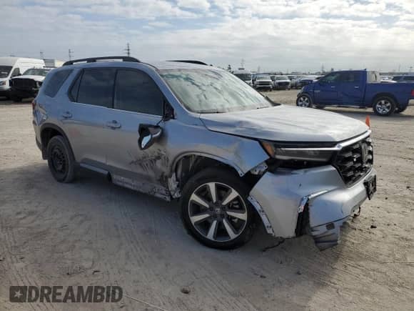 2023 Honda Pilot Touring с VIN 5FNYG2H73PB000923, выставлен на аукционе Copart как лот 41459755 с пробегом 39 829 миль миль и Списание • Salvage title. История ставок и продаж доступна на DreamBid. Изображение 4.