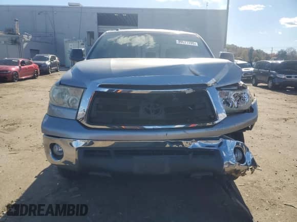 2010 Toyota Tundra z VIN 5TFUY5F1XAX129685, wystawiony jako Copart lot #89627295 z przebiegiem 133 830 mil mil oraz Szkoda całkowita • Salvage title. Historia ofert i sprzedaży dostępna na DreamBid. Obrazek 5.