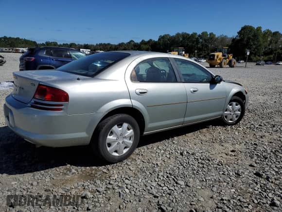2006 Dodge Stratus SXT with VIN 1B3AL46T46N221165, listed as a Copart auction lot 84929085 with 220,338 mi miles and Salvage title. Bid and sale history available at DreamBid. Image 3.