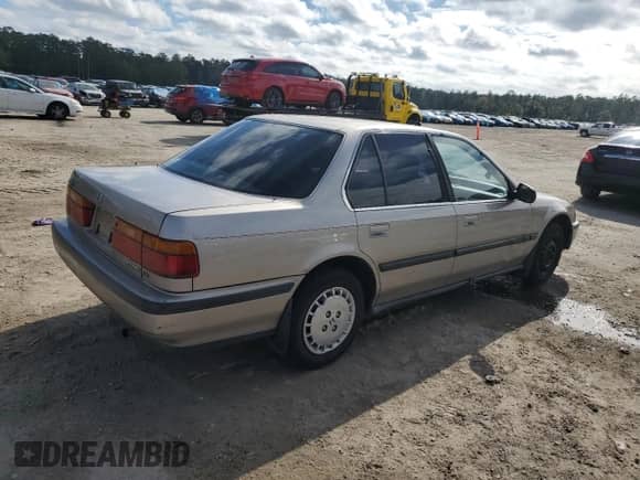 1990 Honda Accord с VIN 1HGCB7658LA103783, выставлен на аукционе Copart как лот 81592564 с пробегом 239 747 миль миль и Списание • Salvage title. История ставок и продаж доступна на DreamBid. Изображение 3.