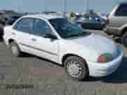 2000 Chevrolet Metro Lsi z VIN 2C1MR5226Y6715724, wystawiony jako IAAI lot #42726106 z przebiegiem 156 290 mil mil oraz . Historia ofert i sprzedaży dostępna na DreamBid. Obrazek 1.