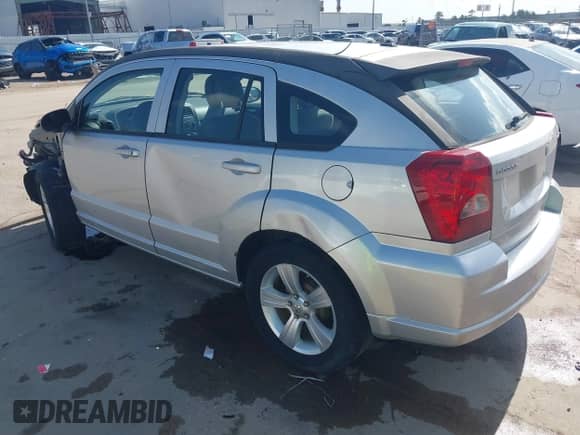 2010 Dodge Caliber SXT with VIN 1B3CB4HA7AD660883, listed as a IAAI auction lot 42270568 with 146,723 mi miles and . Bid and sale history available at DreamBid. Image 3.