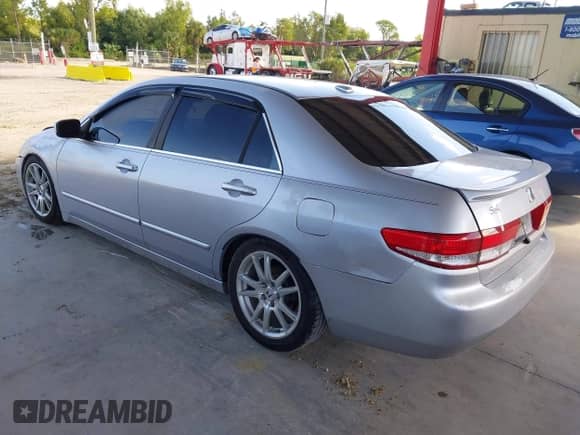 2004 Honda Accord EX with VIN 1HGCM66564A084706, listed as a IAAI auction lot 43311300 with 164,530 mi miles and . Bid and sale history available at DreamBid. Image 3.