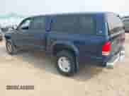 2002 Dodge Dakota SLT z VIN 1B7HG48NX2S682849, wystawiony jako IAAI lot #43032345 z przebiegiem 192 599 mil mil oraz . Historia ofert i sprzedaży dostępna na DreamBid. Obrazek 3.