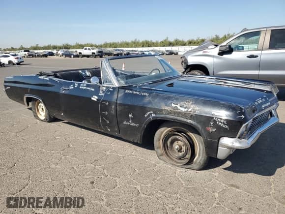 1965 Chevrolet Impala с VIN 166675F316774, выставлен на аукционе Copart как лот 68130684 с пробегом 36 203 миль миль и Списание • Salvage title. История ставок и продаж доступна на DreamBid. Изображение 4.