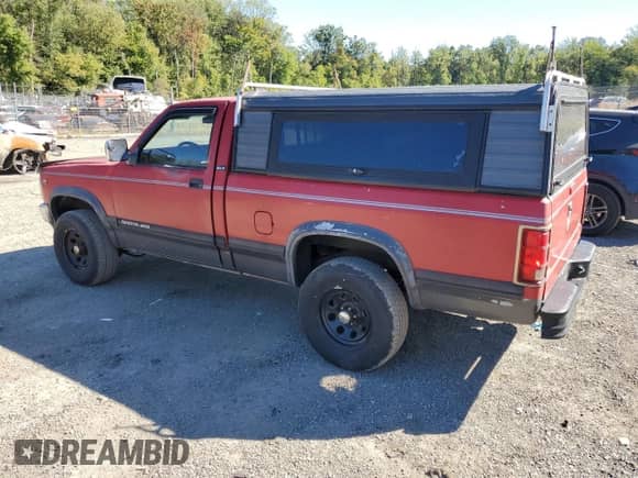 1994 Dodge Dakota z VIN 1B7GG26X3RS605626, wystawiony jako Copart lot #75293854 z przebiegiem 159 432 mil mil oraz Szkoda całkowita • Salvage title. Historia ofert i sprzedaży dostępna na DreamBid. Obrazek 2.