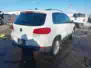 2014 Volkswagen Tiguan SEL with VIN WVGAV3AX8EW538318, listed as a IAAI auction lot 41277703 with 130,827 mi miles and . Bid and sale history available at DreamBid. Image 4.