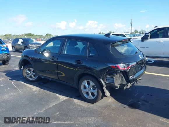 2025 Honda HR-V LX with VIN 3CZRZ1H38SM711151, listed as a IAAI auction lot 42902721 with 54,502 mi miles and . Bid and sale history available at DreamBid. Image 3.