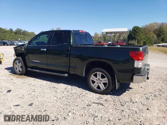 2010 Toyota Tundra Limited with VIN 5TFBY5F19AX131368, listed as a Copart auction lot 86862875 with 292,736 mi miles and Salvage title. Bid and sale history available at DreamBid. Image 2.