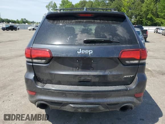 2016 Jeep Grand Cherokee SRT z VIN 1C4RJFDJ2GC300593, wystawiony jako Copart lot #54701035 z przebiegiem 112 676 mil mil oraz Szkoda całkowita • Salvage title. Historia ofert i sprzedaży dostępna na DreamBid. Obrazek 6.