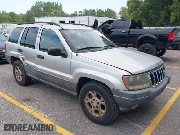 2002 Jeep Grand Cherokee с VIN 1J4GX38S92C237261, выставлен на аукционе IAAI как лот 42923904 с пробегом 112 640 миль миль и . История ставок и продаж доступна на DreamBid. Изображение 1.