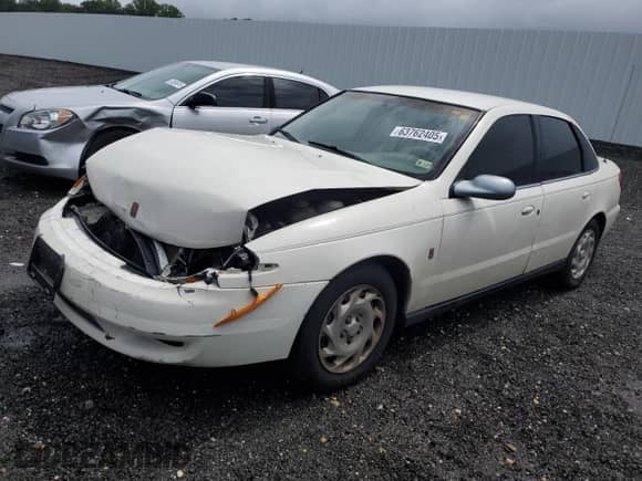 2002 Saturn LS с VIN 1G8JU54F52Y506149, выставлен на аукционе Copart как лот 63762405 с пробегом Не указан миль и Списание • Salvage title. История ставок и продаж доступна на DreamBid. Изображение 1.