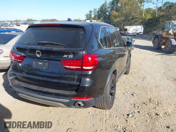 2016 BMW X5 xDrive35i with VIN 5UXKR0C52G0P26585, listed as a IAAI auction lot 43518052 with 137,194 mi miles and . Bid and sale history available at DreamBid. Image 4.