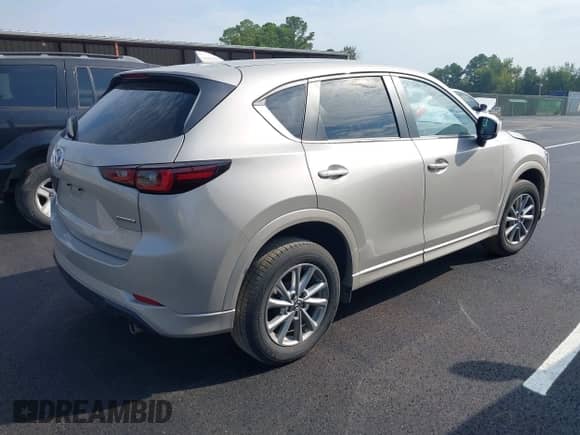 2024 Mazda CX-5 S Select z VIN JM3KFBBL6R0500212, wystawiony jako IAAI lot #43266605 z przebiegiem 38 461 mil mil oraz . Historia ofert i sprzedaży dostępna na DreamBid. Obrazek 4.