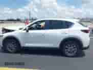 2022 Mazda CX-5 S Select z VIN JM3KFBBM1N0612211, wystawiony jako IAAI lot #42379700 z przebiegiem 30 439 mil mil oraz . Historia ofert i sprzedaży dostępna na DreamBid. Obrazek 14.