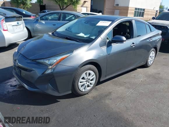 2017 Toyota Prius Two z VIN JTDKBRFUXH3037827, wystawiony jako IAAI lot #43303617 z przebiegiem 172 068 mil mil oraz . Historia ofert i sprzedaży dostępna na DreamBid. Obrazek 19.