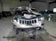 2014 Jeep Grand Cherokee Limited z VIN 1C4RJFBGXEC233620, wystawiony jako Copart lot #80386225 z przebiegiem 169 422 mil mil oraz Szkoda całkowita • Salvage title. Historia ofert i sprzedaży dostępna na DreamBid. Obrazek 5.