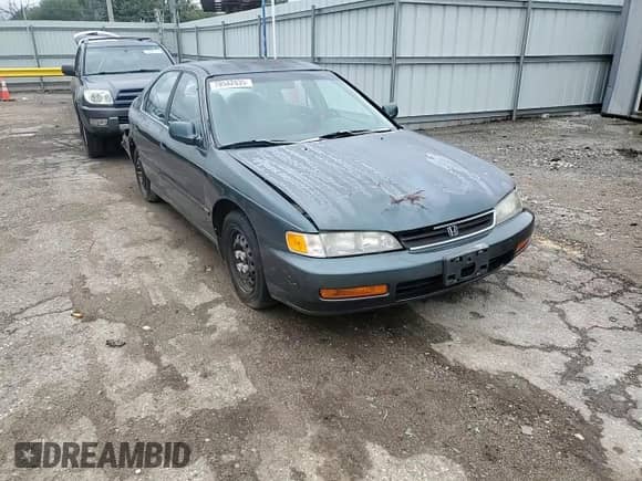 1997 Honda Accord with VIN 1HGCE6641VA021213, listed as a Copart auction lot 70542035 with 198,076 mi miles and Salvage title. Bid and sale history available at DreamBid. Image 13.