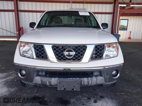 2008 Nissan Frontier SE with VIN 1N6AD07UX8C410054, listed as a IAAI auction lot 43227823 with 211,710 mi miles and . Bid and sale history available at DreamBid. Image 12.