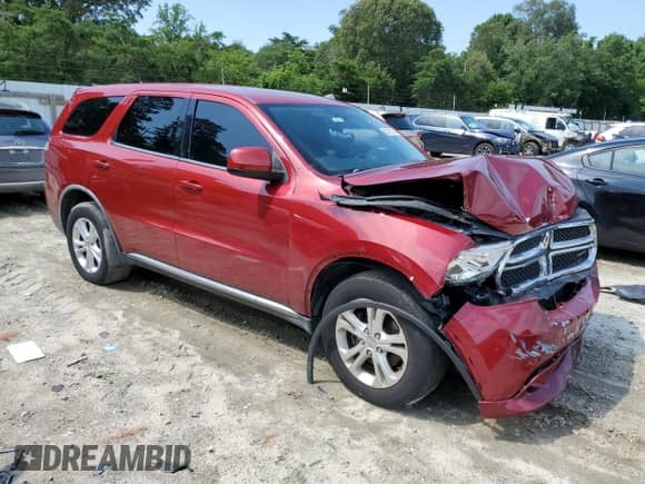 2011 Dodge Durango Express with VIN 1D4RD2GG5BC617117, listed as a Copart auction lot 63713735 with 130,660 mi miles and Salvage title. Bid and sale history available at DreamBid. Image 4.