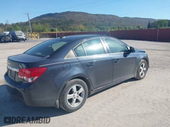 2014 Chevrolet Cruze 1LT с VIN 1G1PC5SB9E7408389, выставлен на аукционе IAAI как лот 43377791 с пробегом 127 080 миль миль и . История ставок и продаж доступна на DreamBid. Изображение 4.