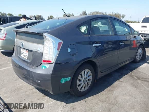 2014 Toyota Prius z VIN JTDKN3DP6E3052659, wystawiony jako IAAI lot #42877264 z przebiegiem 92 214 mil mil oraz . Historia ofert i sprzedaży dostępna na DreamBid. Obrazek 4.