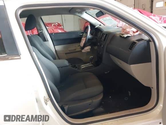 2005 Chrysler 300 300 with VIN 2C3JA43R05H604299, listed as a IAAI auction lot 43141549 with 131,677 mi miles and . Bid and sale history available at DreamBid. Image 5.