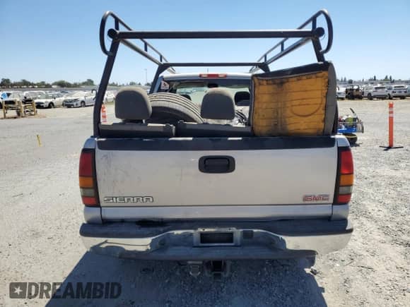 2004 GMC Sierra 1500 SLE с VIN 2GTEC19T341127108, выставлен на аукционе Copart как лот 69636595 с пробегом Не указан миль и Списание • Salvage title. История ставок и продаж доступна на DreamBid. Изображение 6.