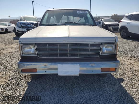 1986 Chevrolet S-10 z VIN 1GCCS14R2G8102739, wystawiony jako Copart lot #62724615 z przebiegiem 235 831 mil mil oraz Szkoda całkowita • Salvage title. Historia ofert i sprzedaży dostępna na DreamBid. Obrazek 5.