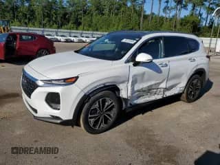 2019 Hyundai Santa Fe Ultimate с VIN 5NMS53AAXKH116022, выставлен на аукционе Copart как лот 70222695 с пробегом Не указан миль и Списание • Salvage title. История ставок и продаж доступна на DreamBid. Изображение 1.