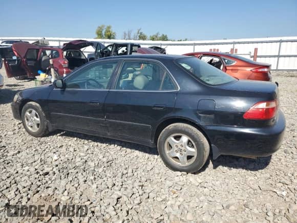 1999 Honda Accord EX with VIN 1HGCG1654XA012935, listed as a Copart auction lot 84449635 with 205,773 mi miles and Non repairable. Bid and sale history available at DreamBid. Image 2.