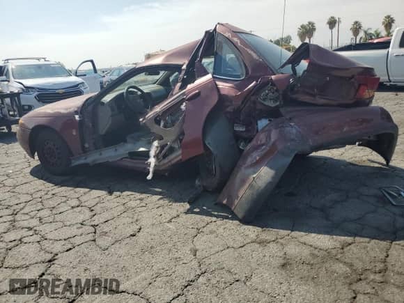 2000 Saturn LS with VIN 1G8JU52F5YY651087, listed as a Copart auction lot 67607595 with 694,978 mi miles and Salvage title. Bid and sale history available at DreamBid. Image 2.